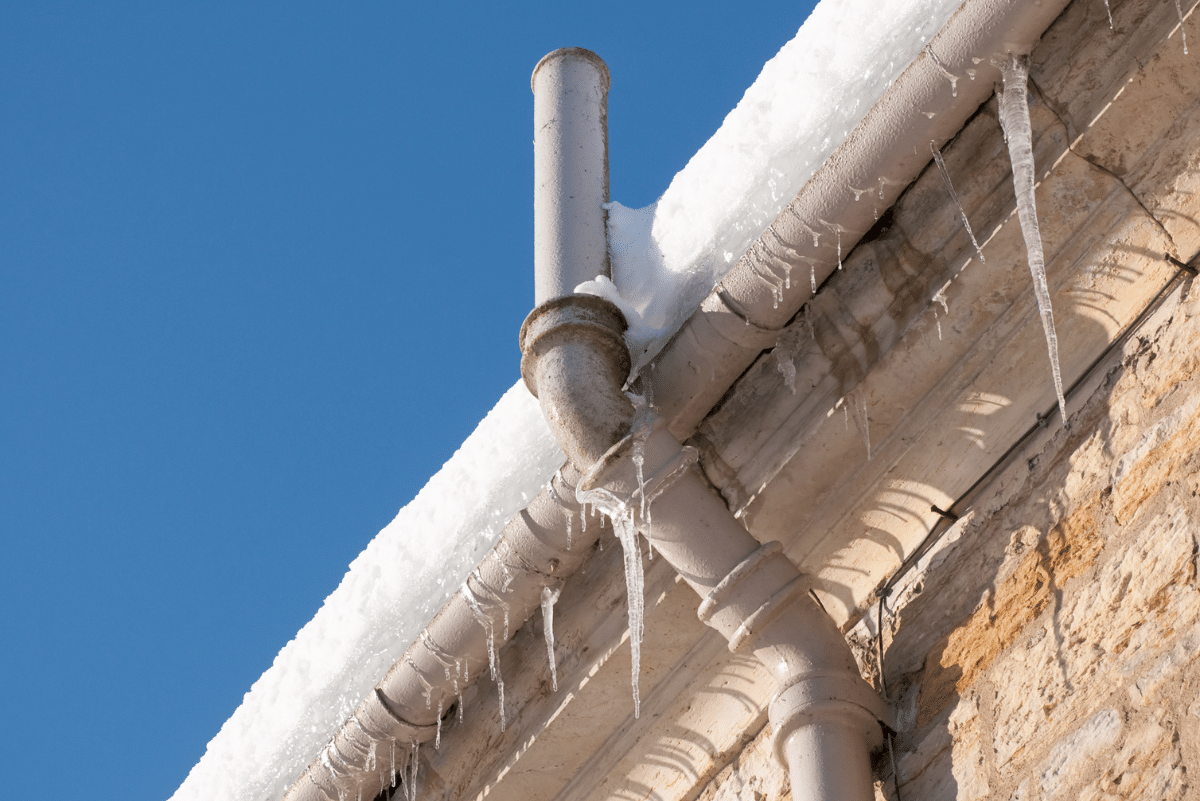 Frozen pipes on house siding