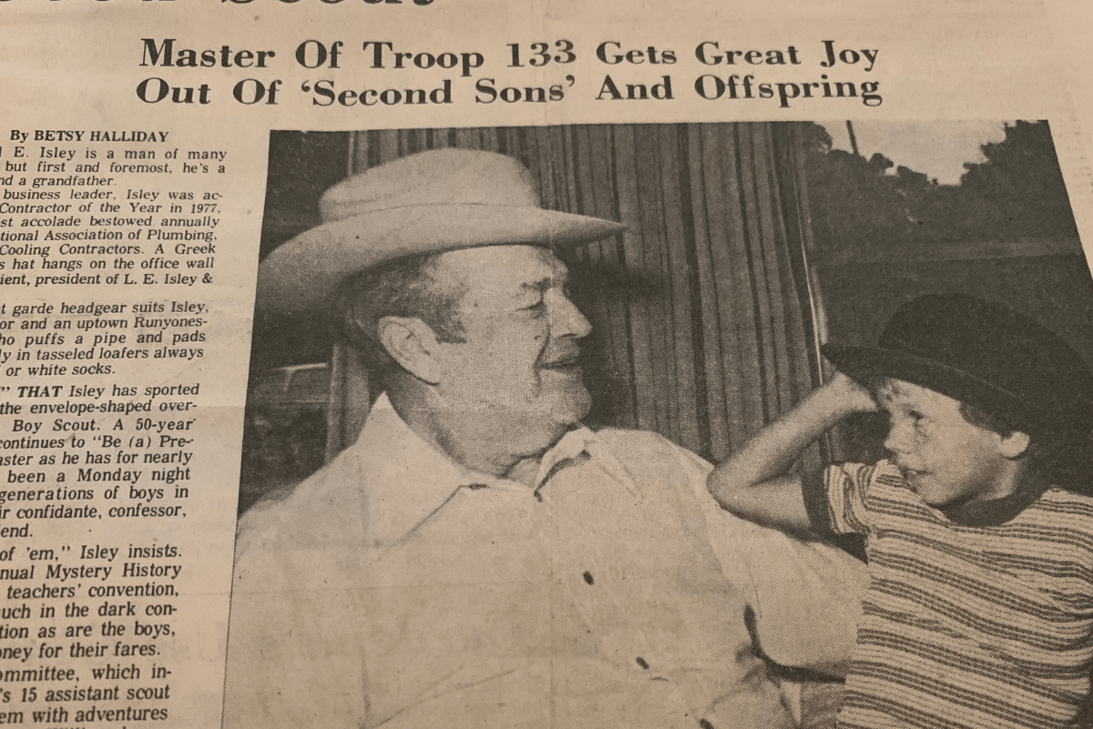 Paul E. Isley with Doug Isley in old newspaper