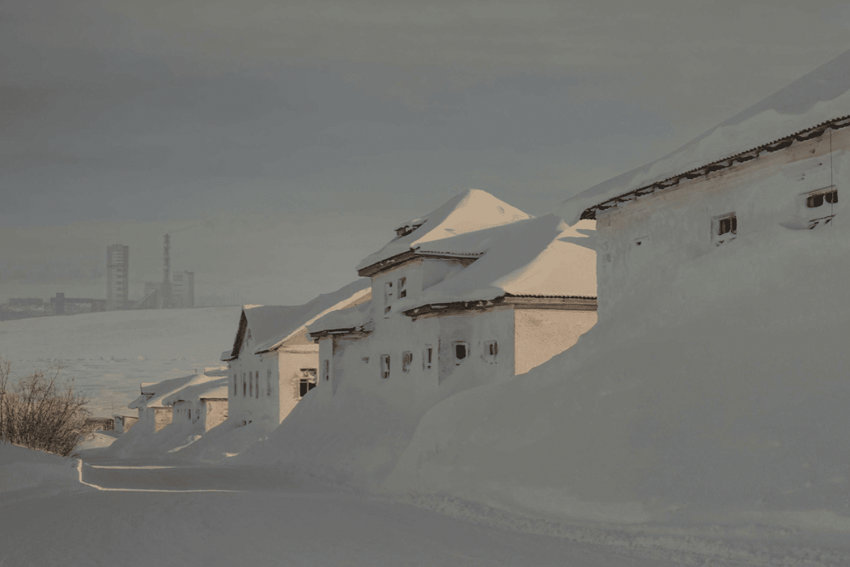 Homes covered in snow in the Tundra